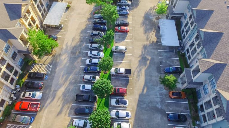 Marked parking bays in a South African sectional title residential complex.