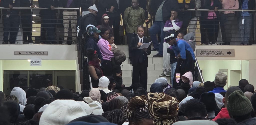 Rhodes SRC president Thalethu Magidela addresses students during a meeting on Monday night.