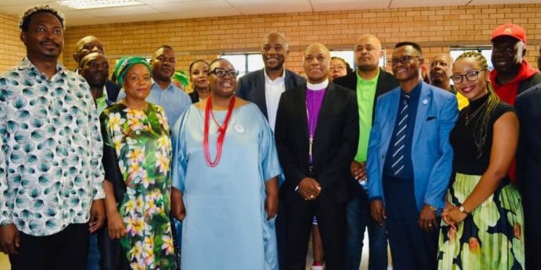 Political leaders, mayoral candidates and ward councillor candidates from different political formations praying together at Grace Bible Church ahead of the local government elections.