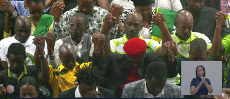 Political leaders, mayoral candidates and ward councillor candidates from different political formations praying together at Grace Bible Church ahead of the local government elections.