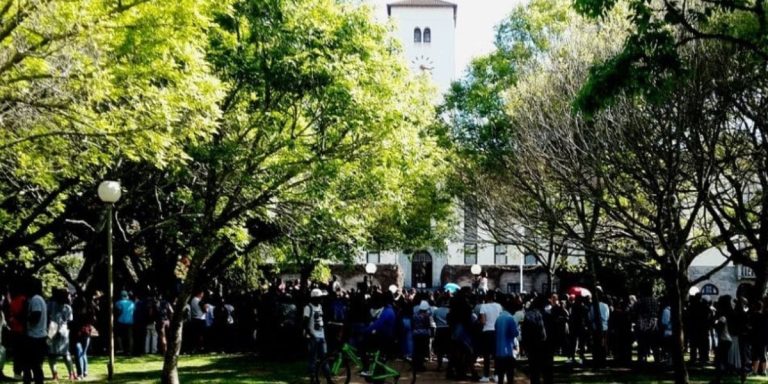 Rhodes deputy VC acknowledges student debt concerns; spokesperson refers arrests to SAPS Rhodes University students gathered during the campus shutdown amid a dispute over student fees.