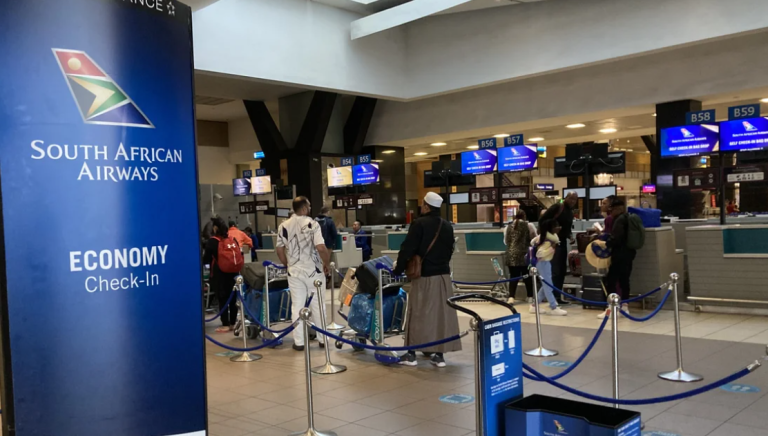 South African Airways (SAA) customer service desk at an airport.