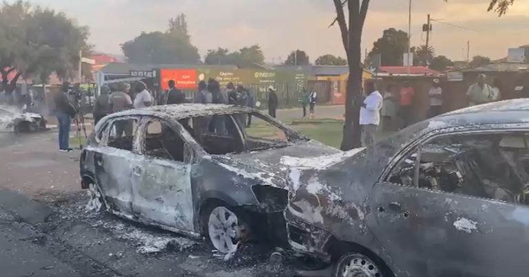 Burnt cars in Soweto following violent protests over asylum seeker applications and immigration policy.