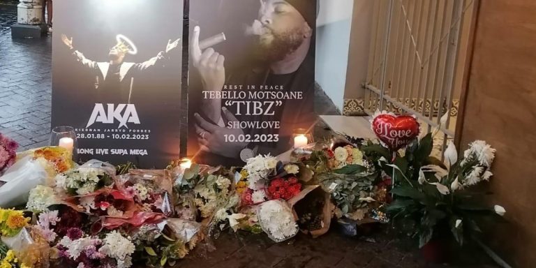 DJ Don Design recounts final moments before AKA and Tibz shooting and chaos that followed Flowers and portraits of AKA and Tibz at a memorial outside Wish Restaurant in Durban.